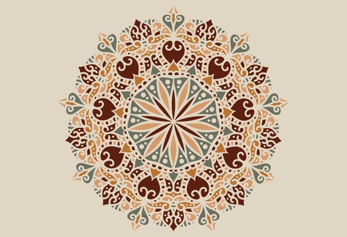 Emblema de YourCarpet.com. Un medallón abstracto de alfombra con rojos, verdes y amarillos sobre un fondo beige