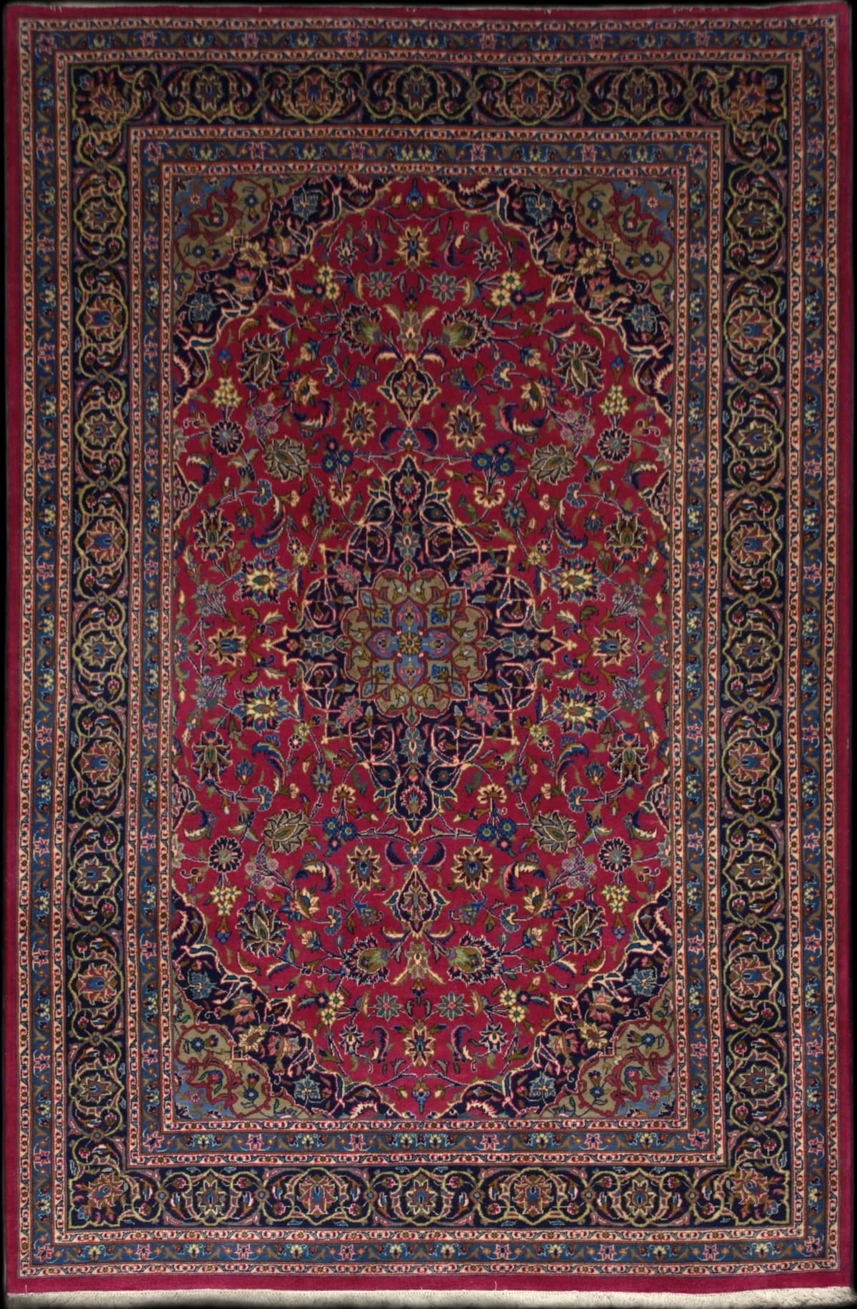 Persian rug of Kashan style in dimensions 310 centimeters length by 203 centimeters width with mainly red and blue colors